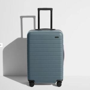 Shop The Bigger Carry-On suitcase in Coast Blue | Away