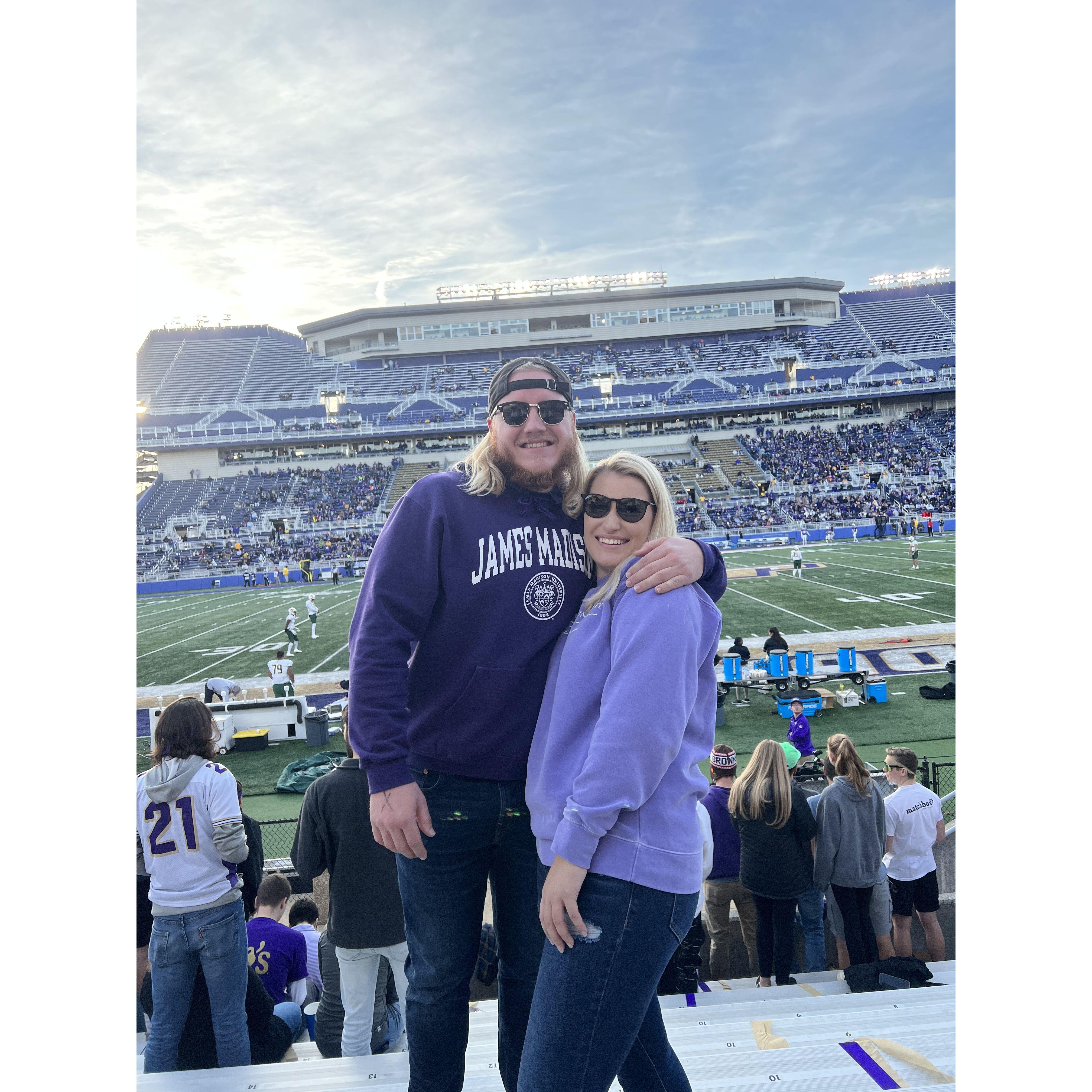 We both went to JMU but didn't know each other, so we had to go to a game together.