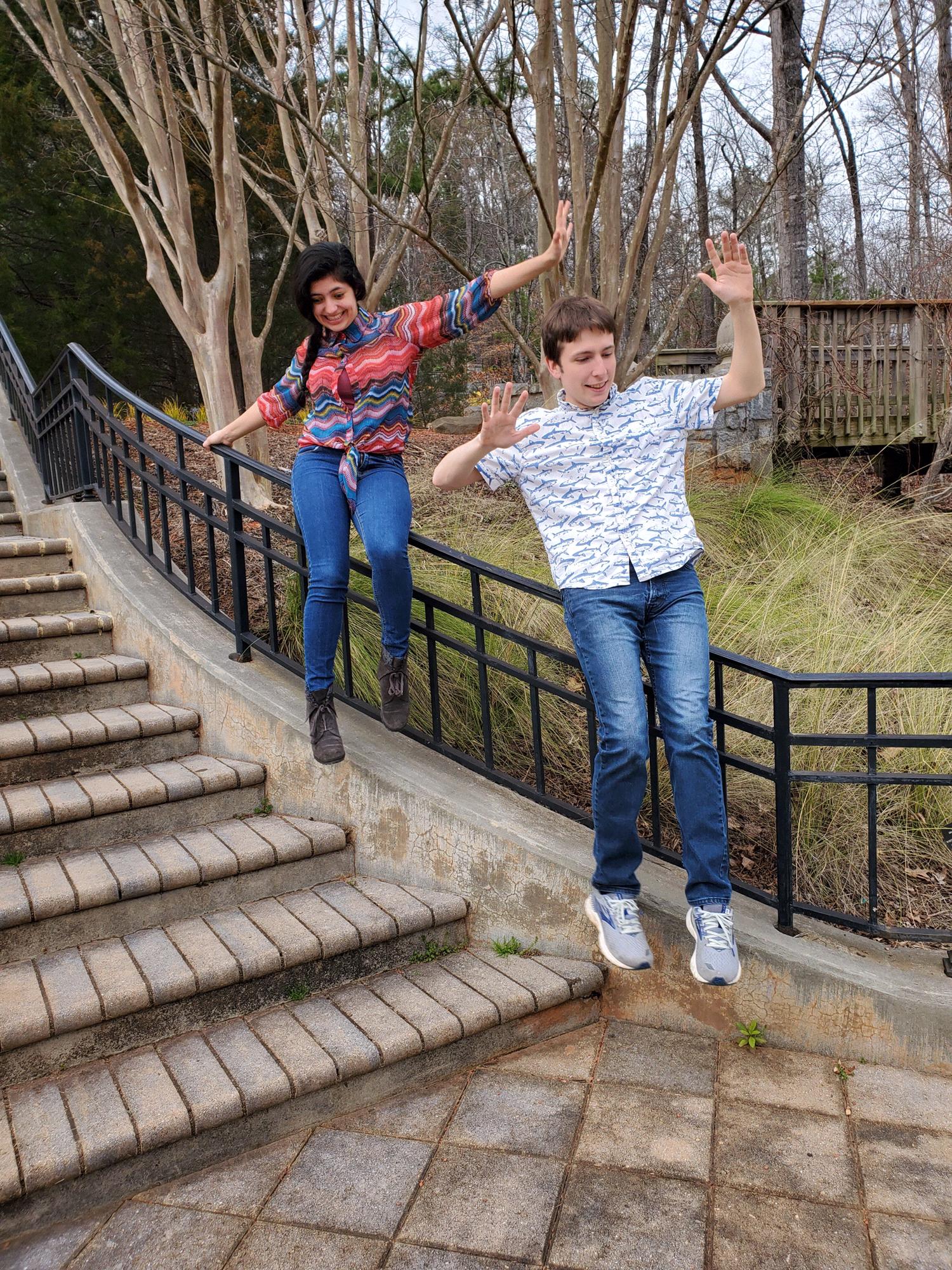 We tried to slide down the railing and fell off immediately XD