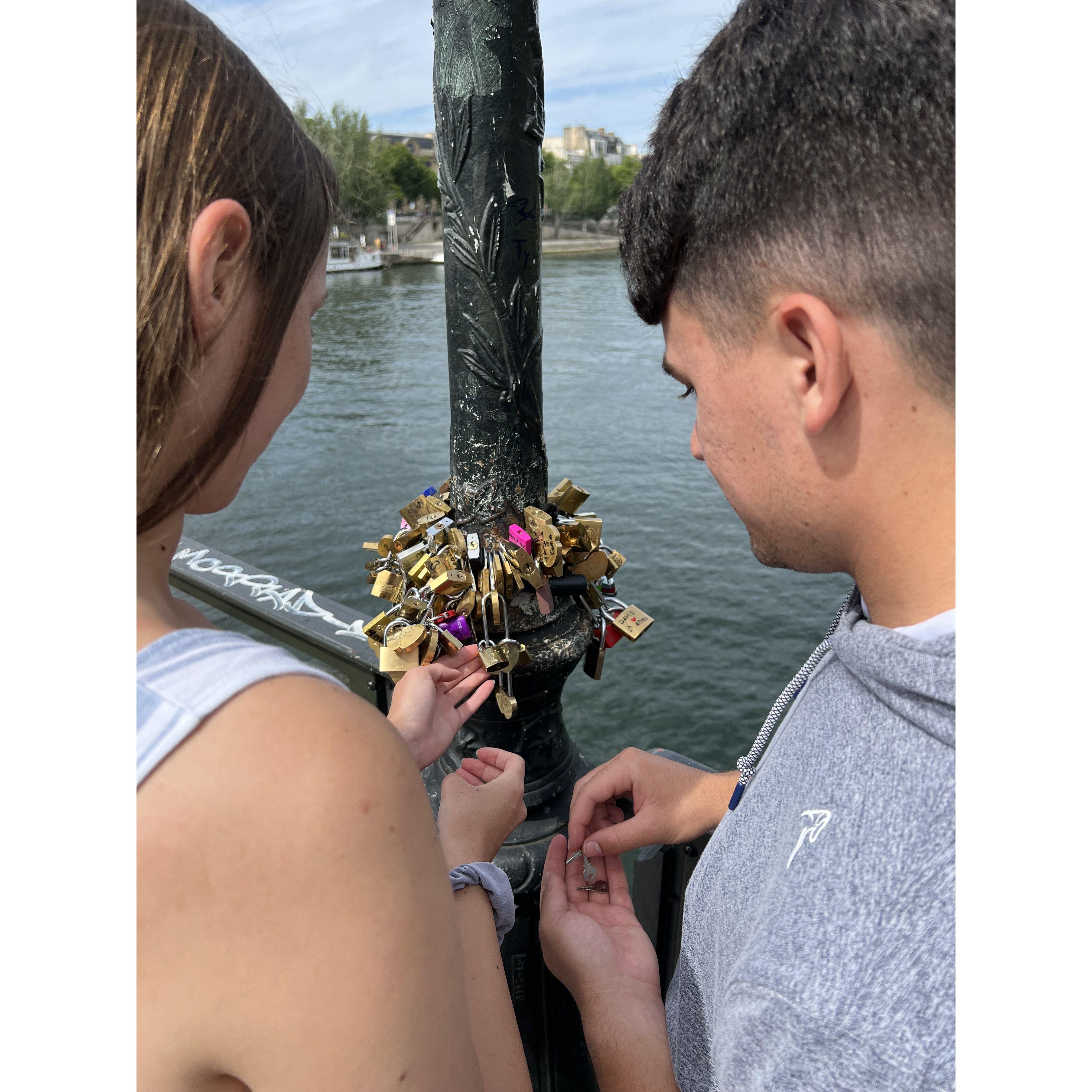 June 26, 2022: Attaching a lock to the Lock Bridge over the Seine
