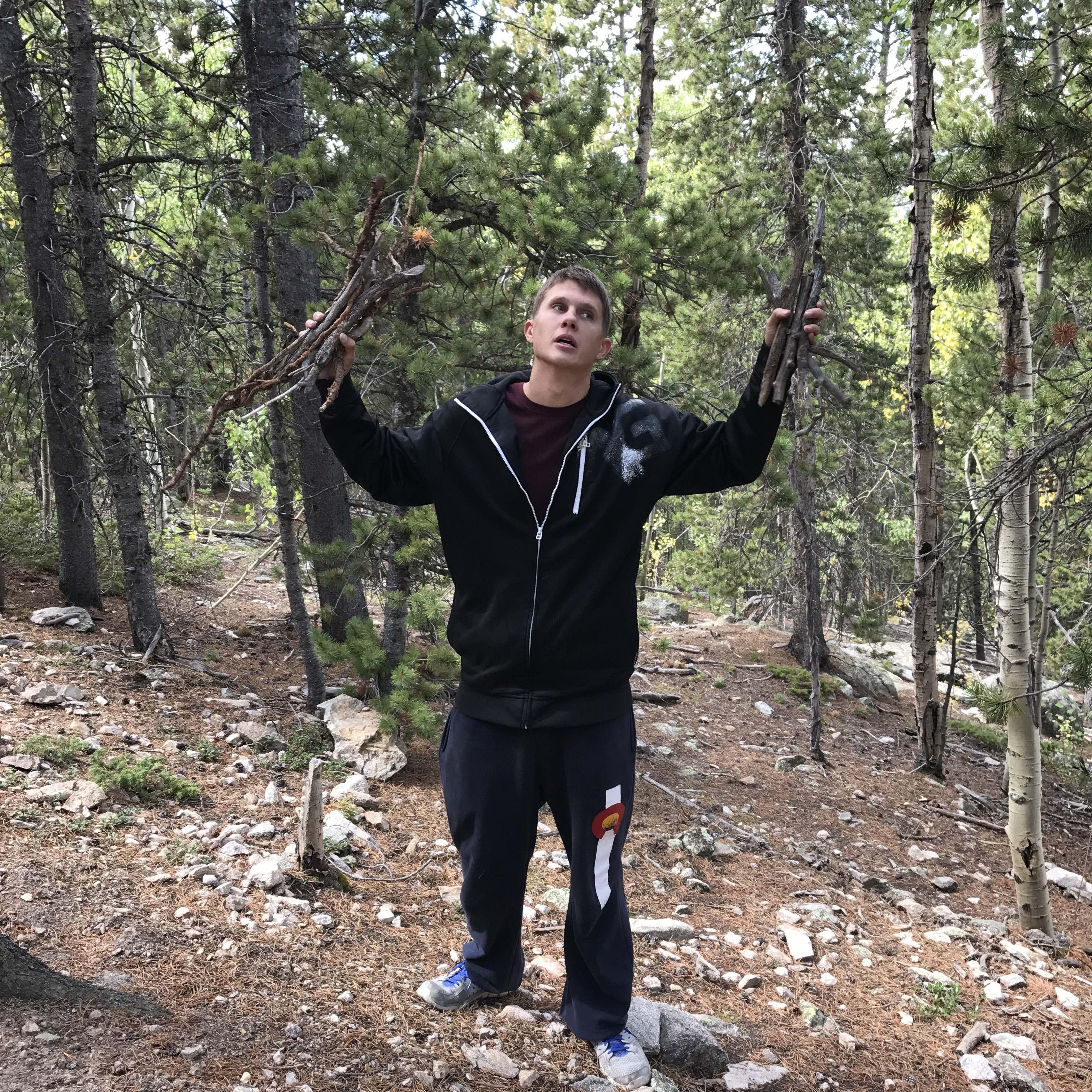 Drake as a tree on our first camping trip
