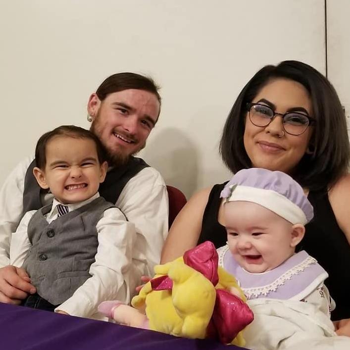 Our little family at Lynnette's wedding. Photo courtesy of Kristine Widney.