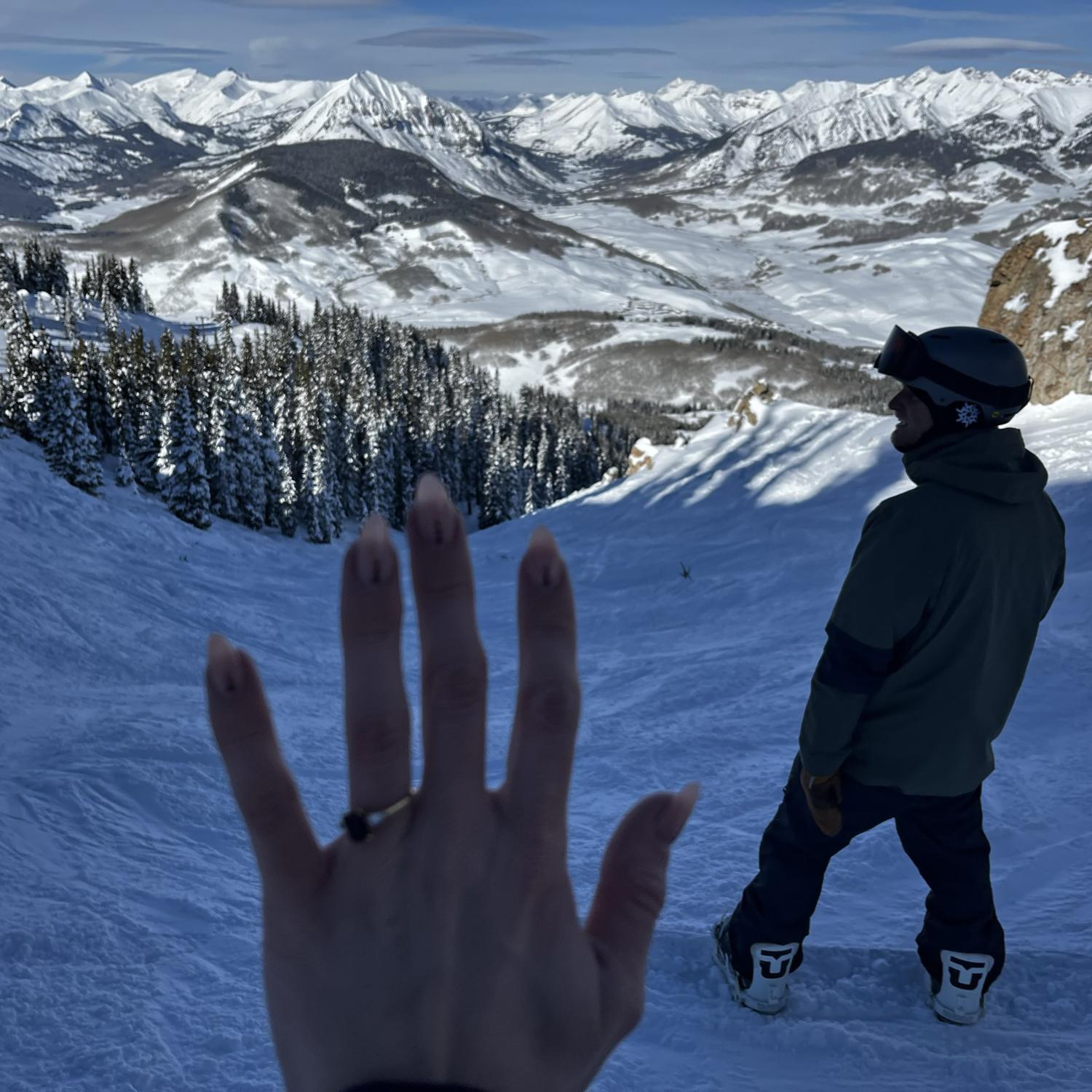 Newly engaged, about to head down the slopes
