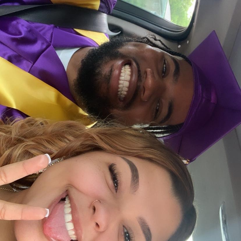 Us running late to our graduation day but still stopping to take a picture!