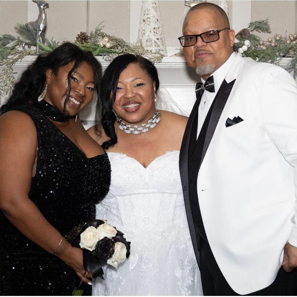The happy couple with the Bride's Matron of Honor, Daughter, Heartbeat