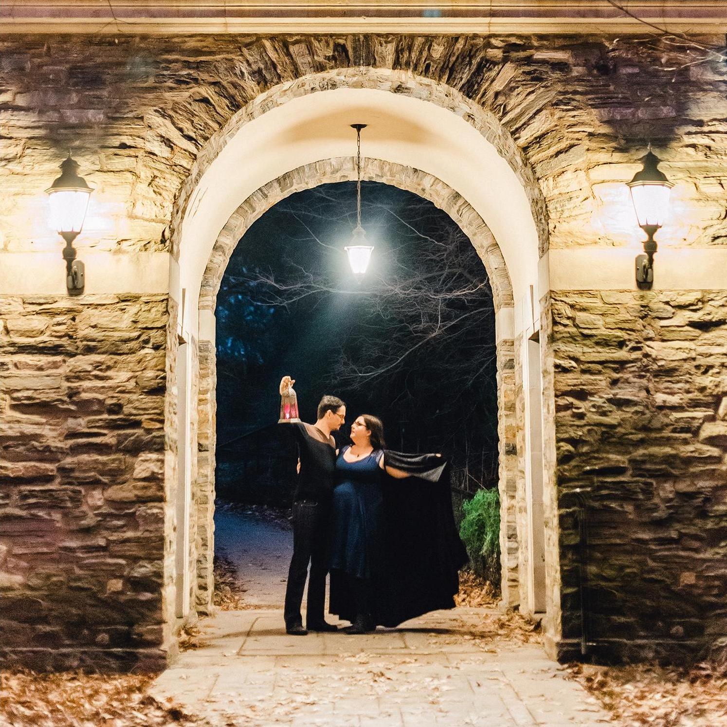 Engagement Photo by Dawn Derbyshire /
Yes we are very extra and had to take some fantastical photos with a cloak and lantern in this dramatic archway at the entrance to the Frick.