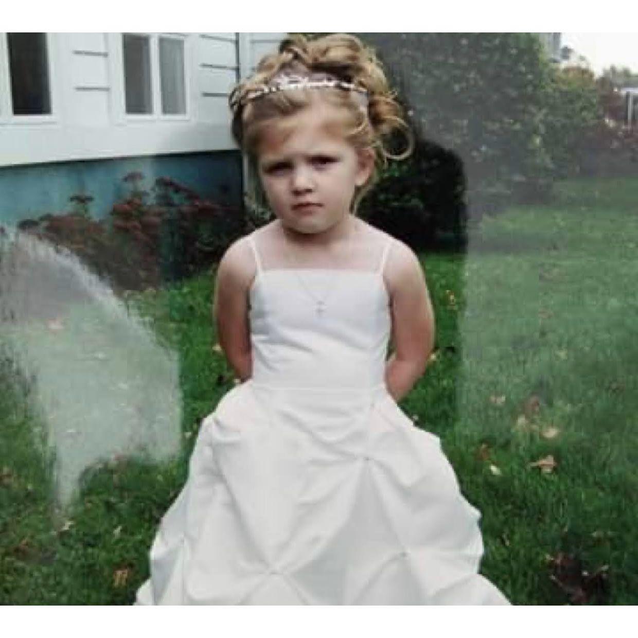 Lindsay's first time in a white dress at Auntie Karen's wedding.
Lindsay was grumpy all day!