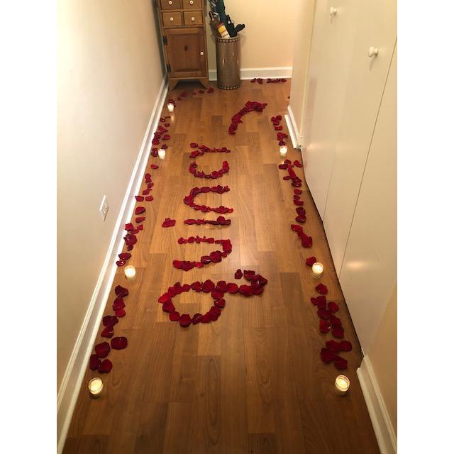 What Quincy saw when she walked in the door for the proposal. Mike's never had the best handwriting, but that looks pretty good!