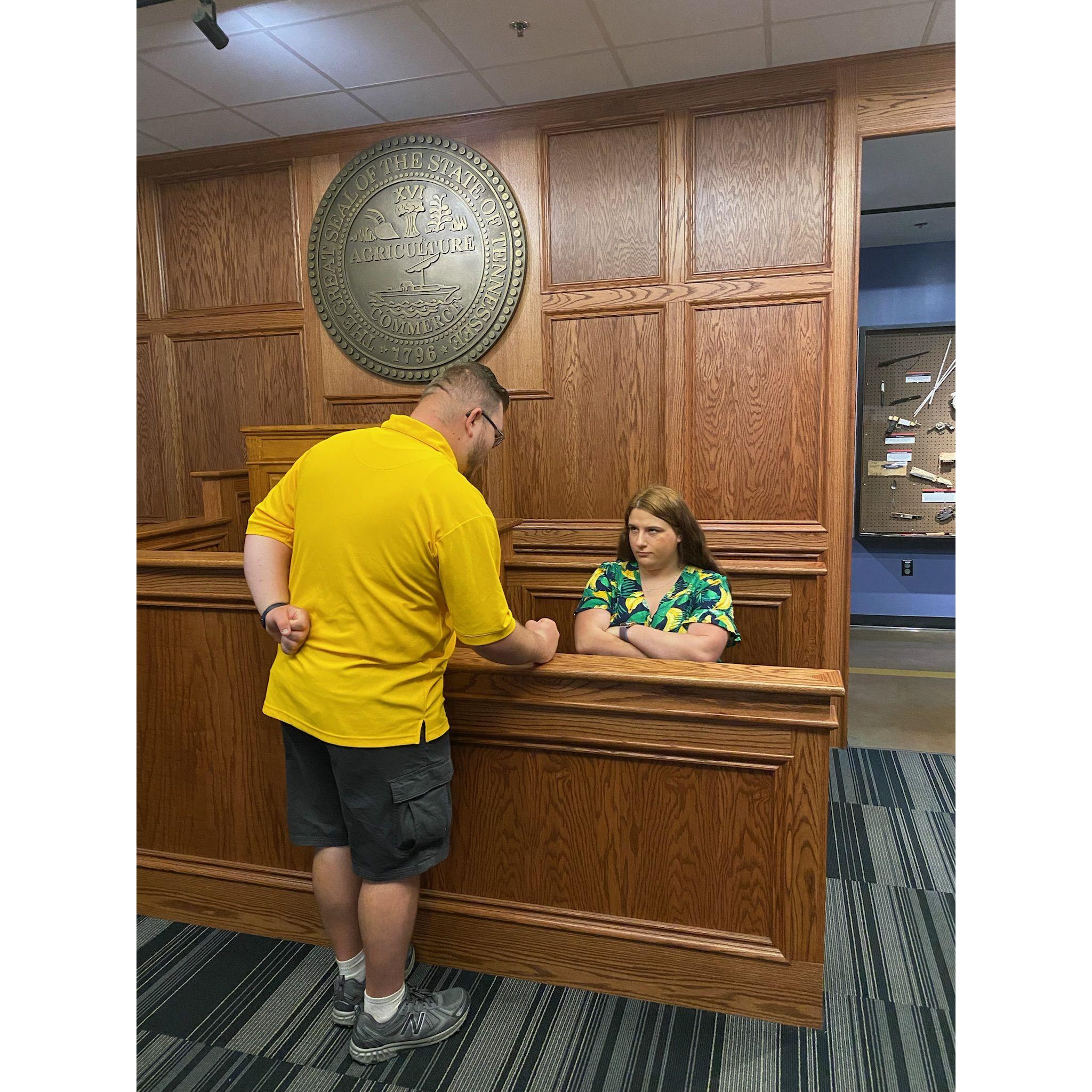 We loved visiting the Crime Museum in Pigeon Forge, where we took the pictures a little too seriously.