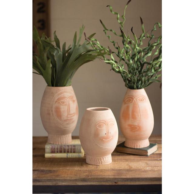 set of 3 clay face pots