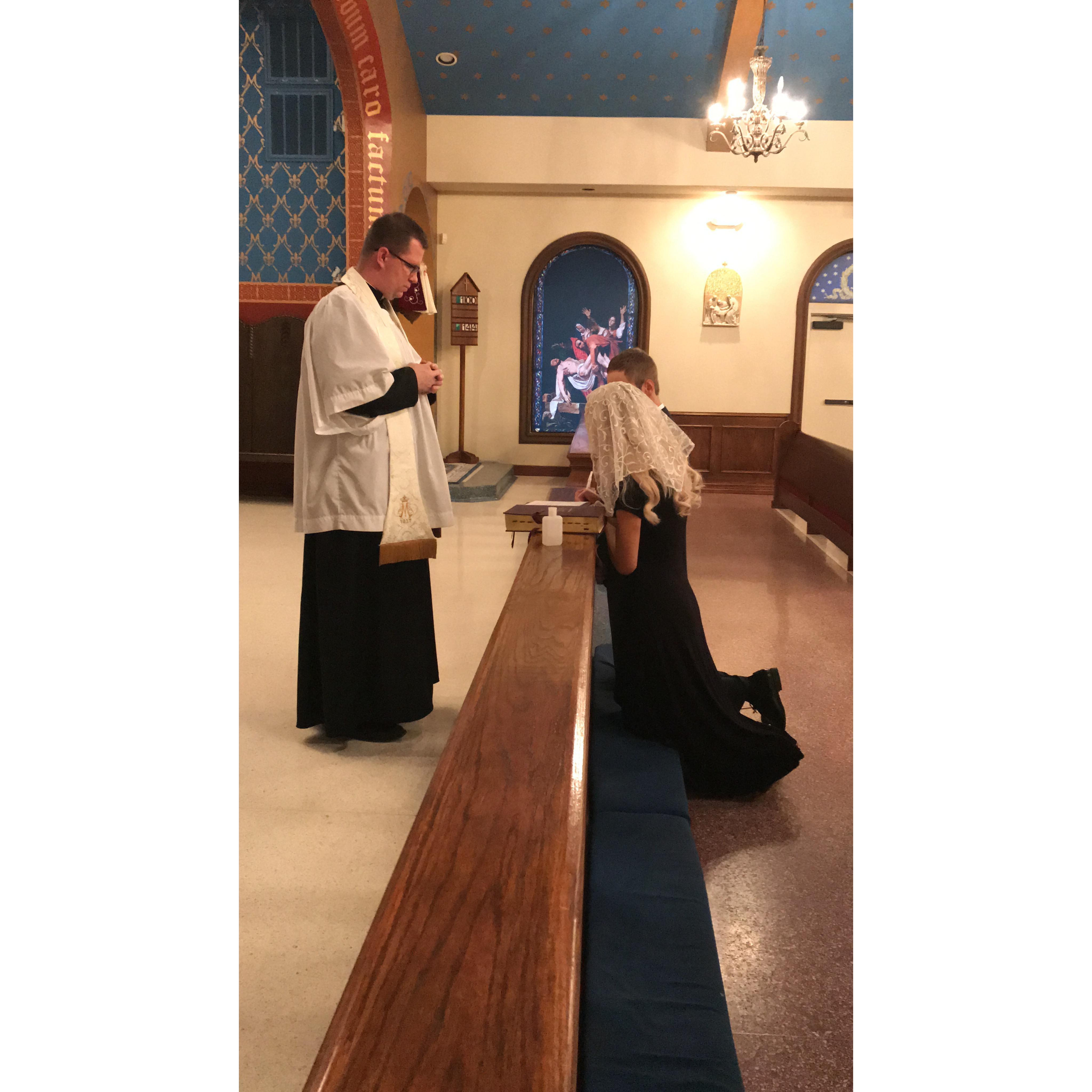 Signing the certificate of betrothal
