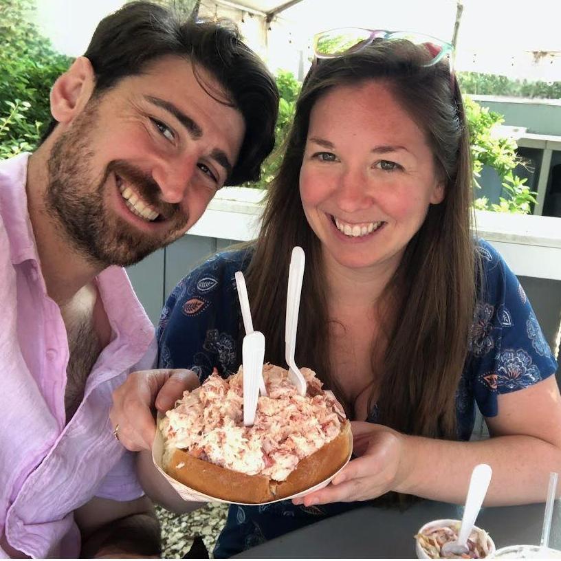 Sharing an overstuffed lobster roll at the Raw Bar in Popponesset Marketplace on Cape Cod.