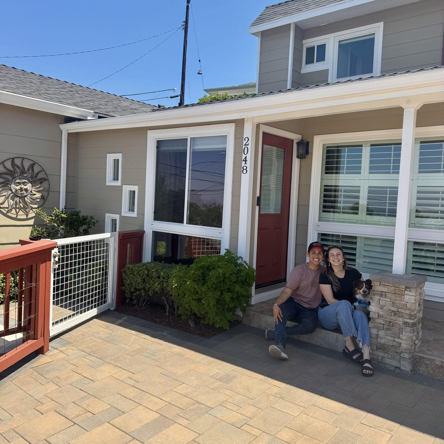 Us and our first house and our first dog!