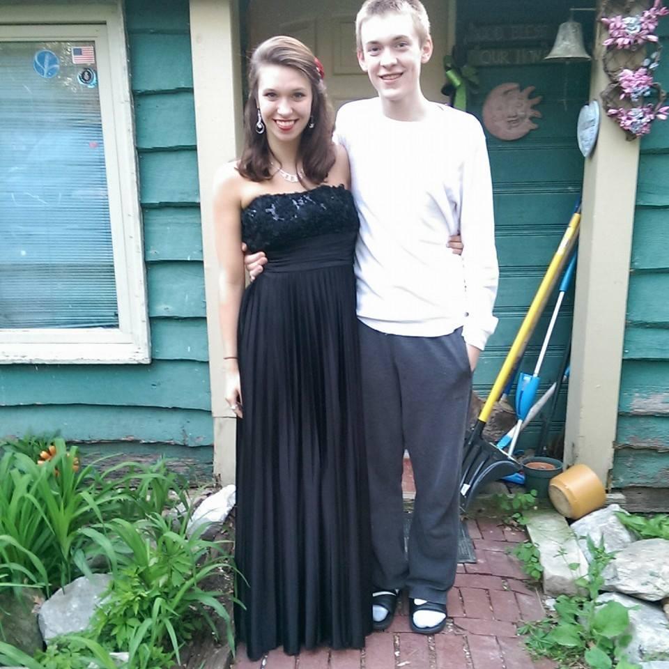 He didn't want to go, but he at least caught a pic with me. My senior prom April 2014.