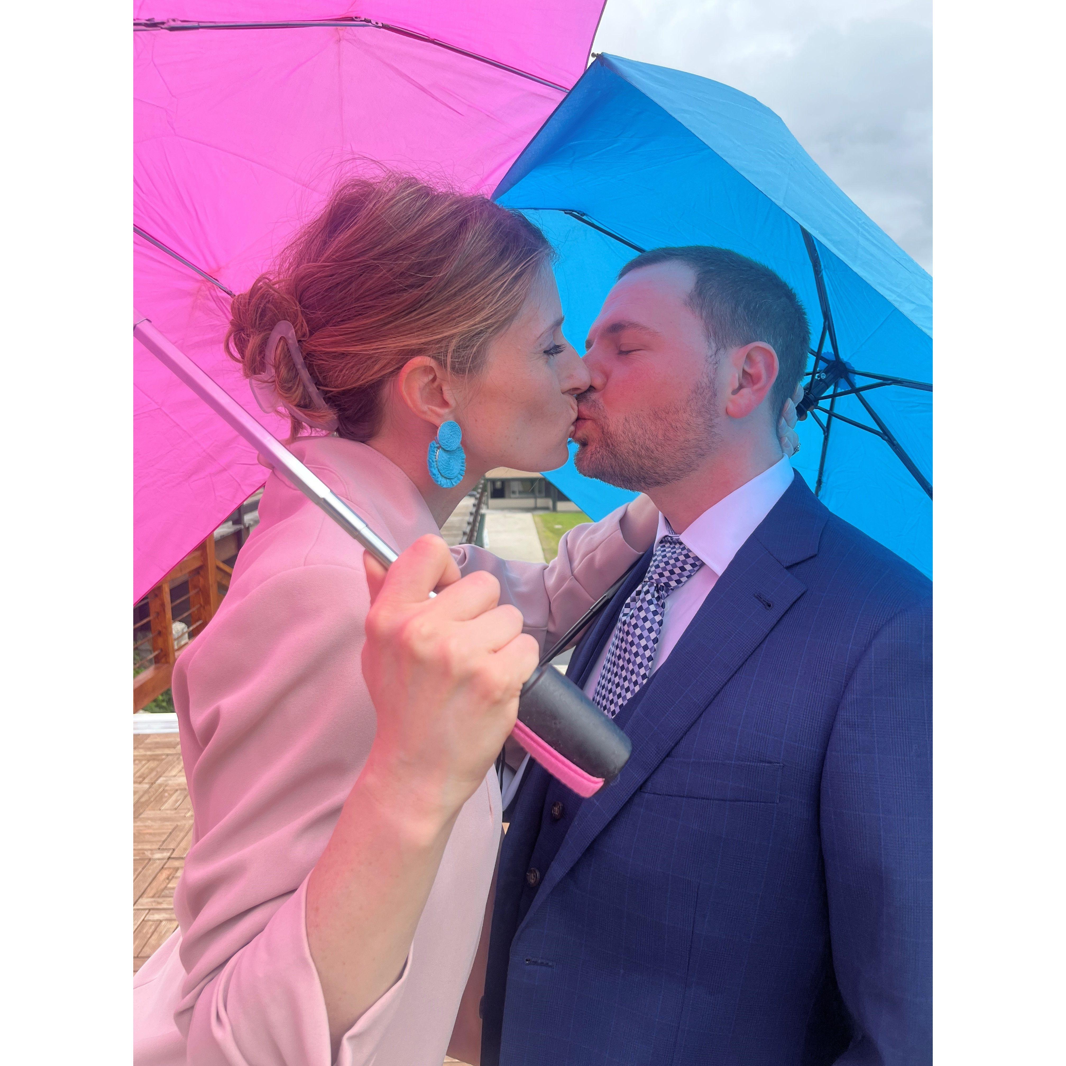 At Shawn and Colleen's wedding, the first one we attended as a couple. Our friend thought it was funny to give us umbrellas that matched our outfits - Thanks Kate!