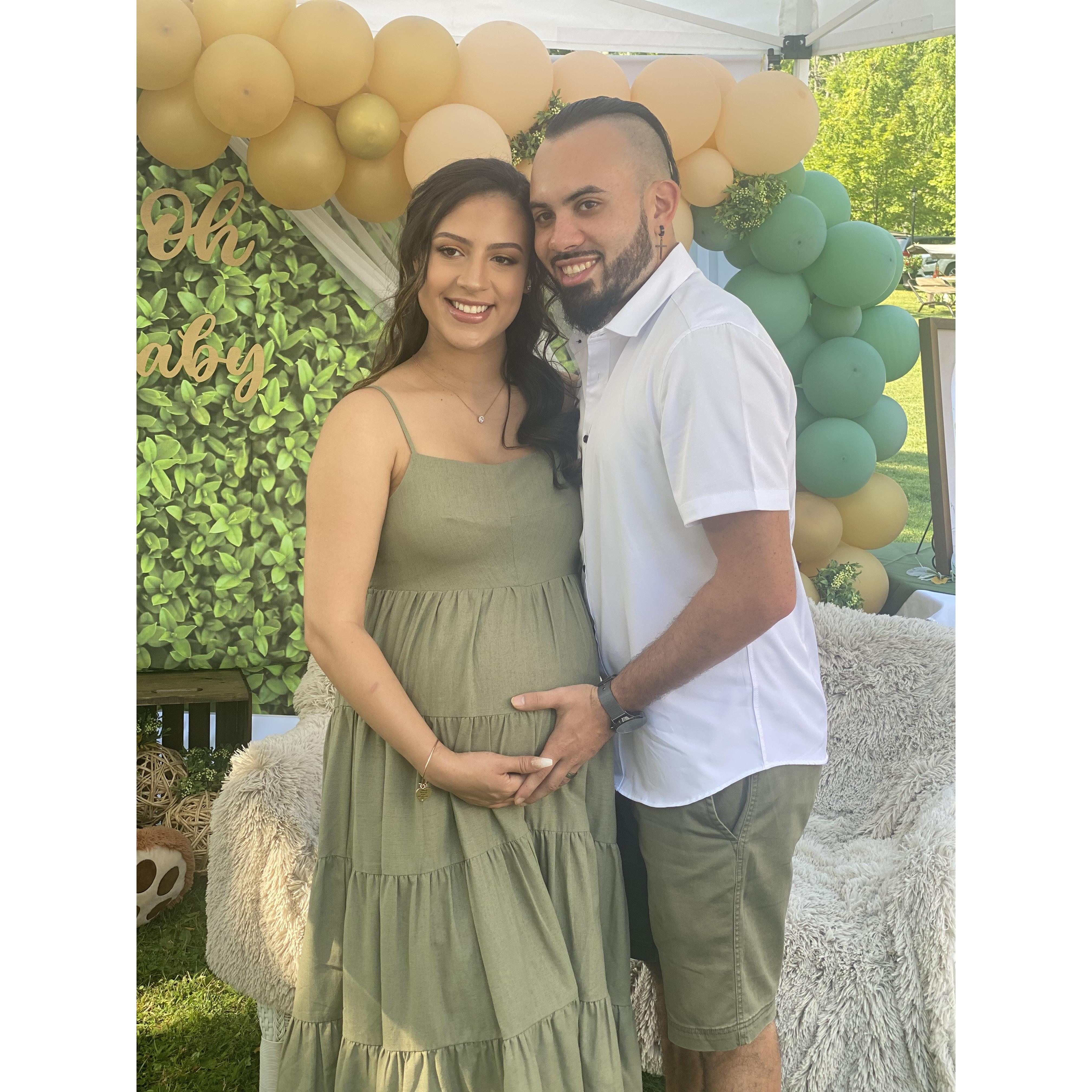 Taken at our baby shower, both of us patiently awaiting the arrival of our son. July 2021