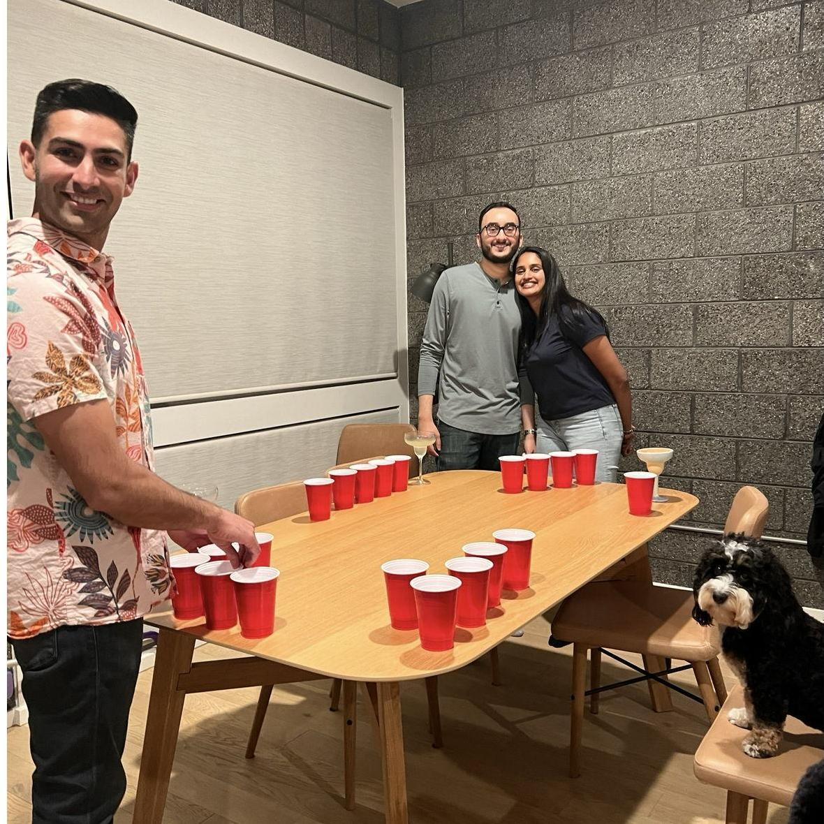 Playing Jai's favorite game with our friends Roshan and Isha. Jai picked Kaia as his teammate because Neelam couldn't make a shot.