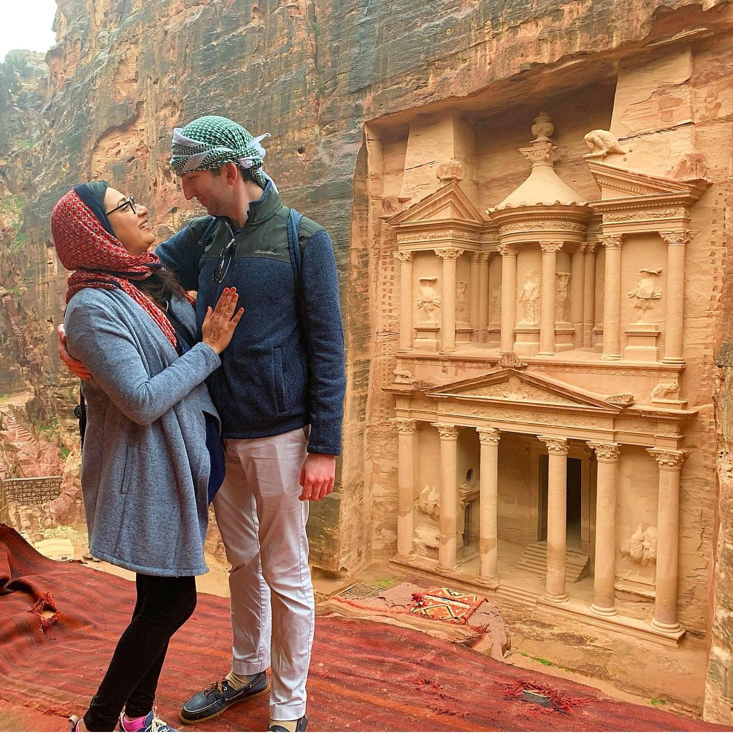 Posing above the Treasury in Petra, Jordan, February 2020.