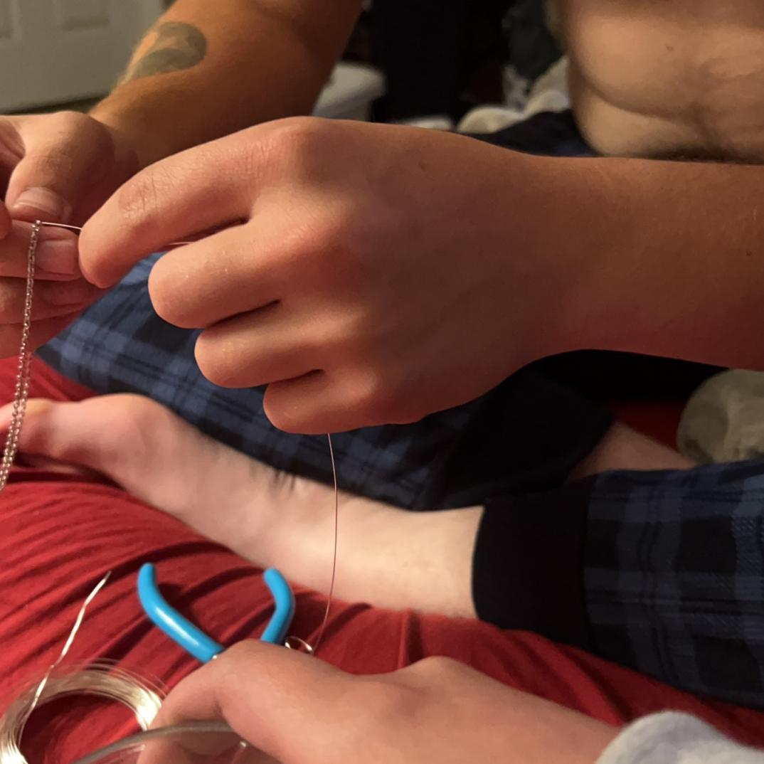 Making necklaces for each other while watching The Notebook