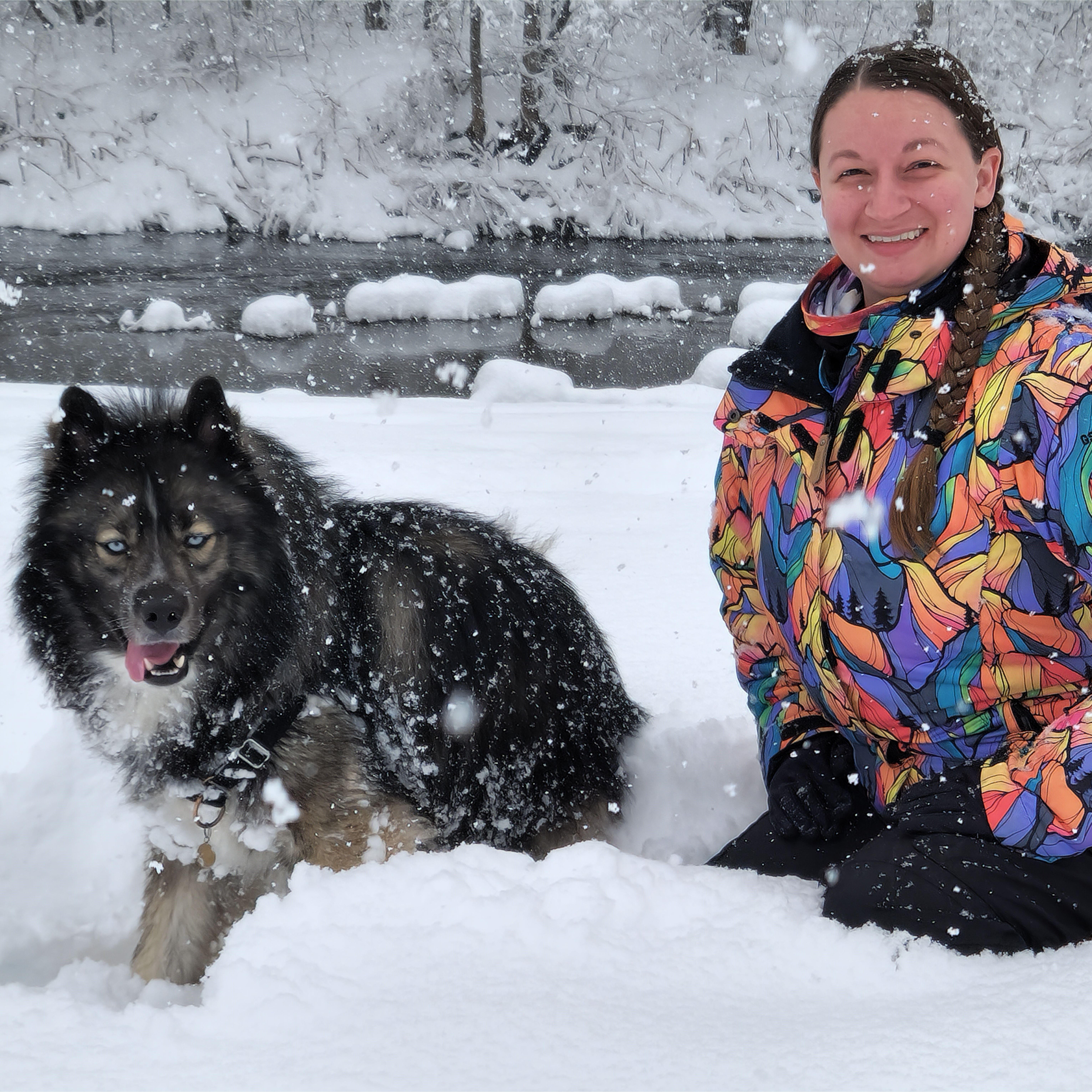 Liz and Tau frolicking in the snow on the riverbank behind our apartment.