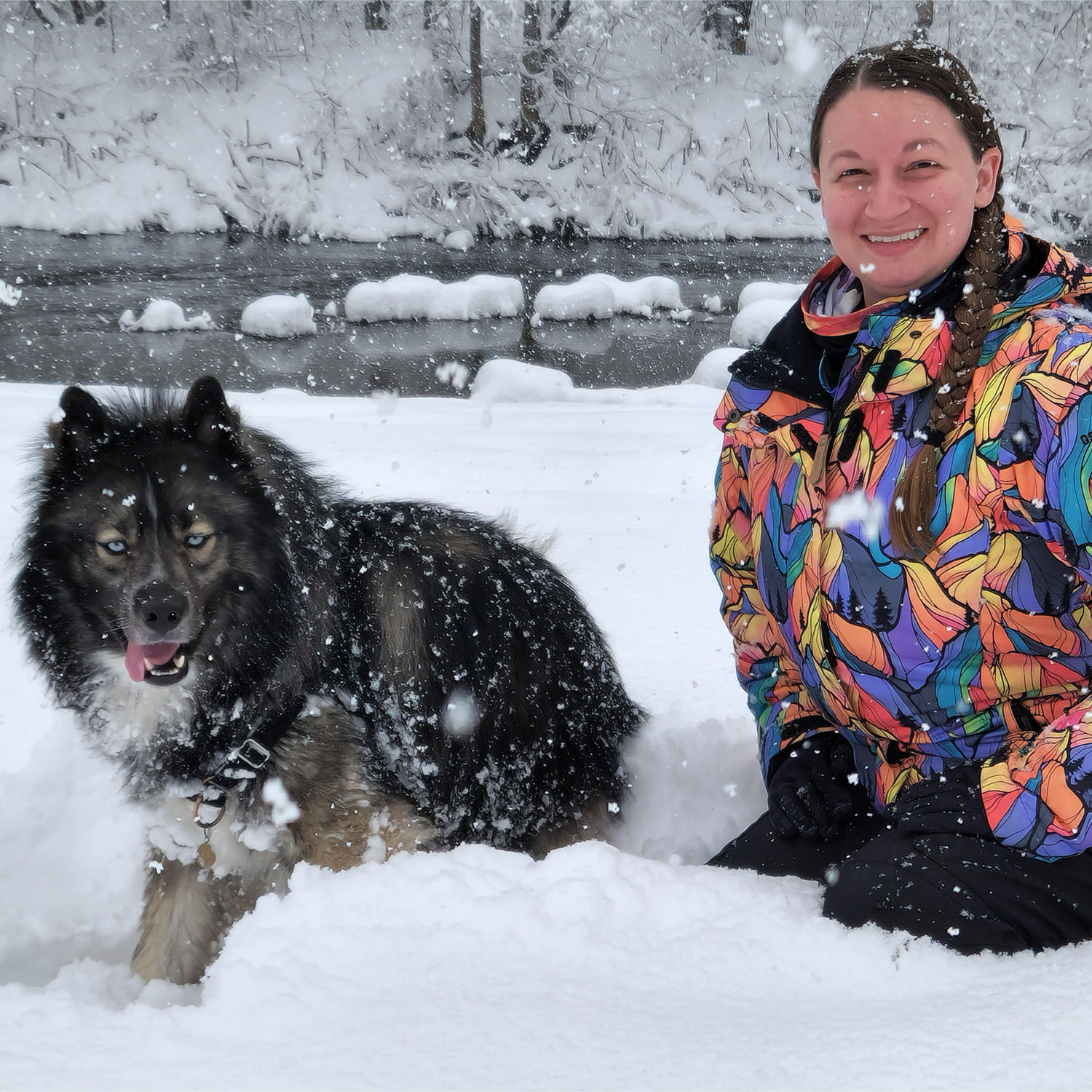 Liz and Tau frolicking in the snow on the riverbank behind our apartment.