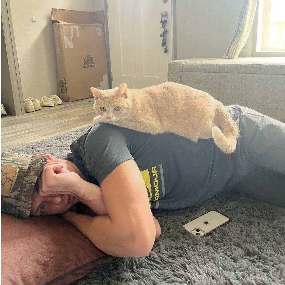 Lulu hanging out with Braden on his lunch break