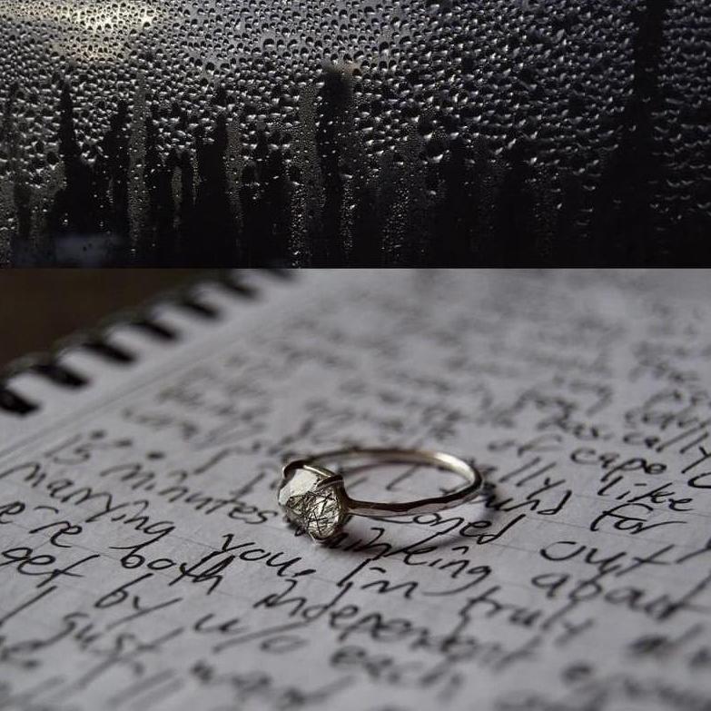 Kendall's engagement ring atop a journal that Conor kept while studying abroad in Cuba