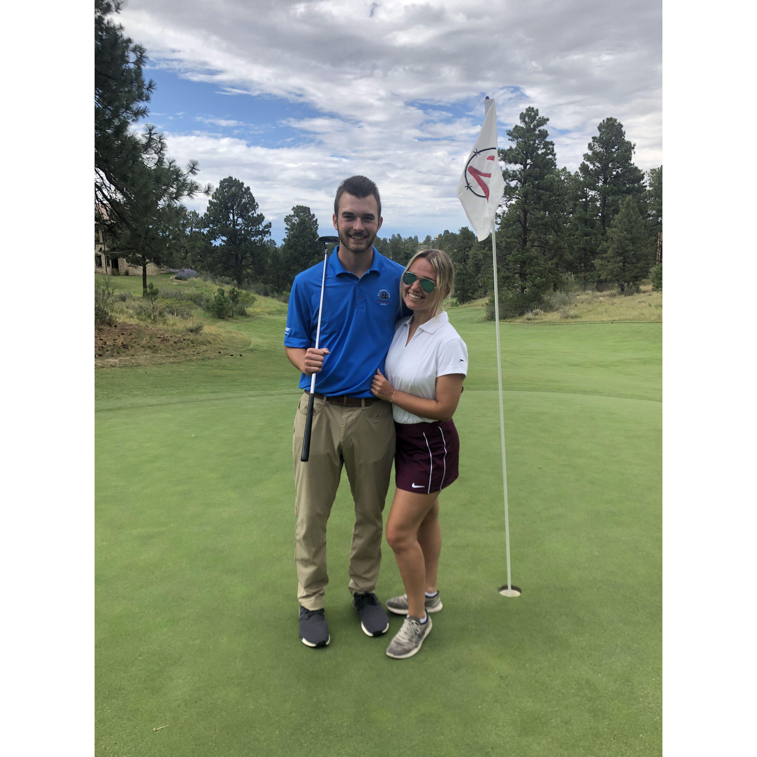 This photo is at Colorado Golf Club, where Thomas interned after his junior year of college. Jess, having no golf experience since about six years old, hung out with Juli while Thomas and Phil played.