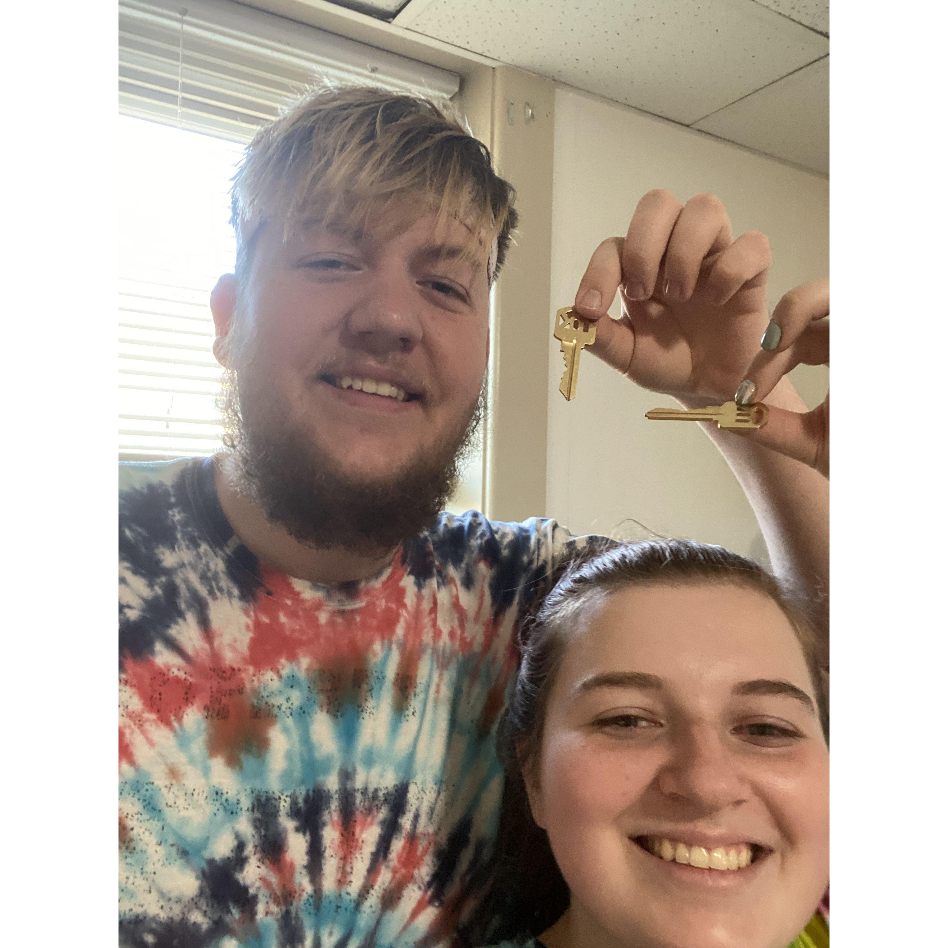 Us with the keys to our first apartment together.