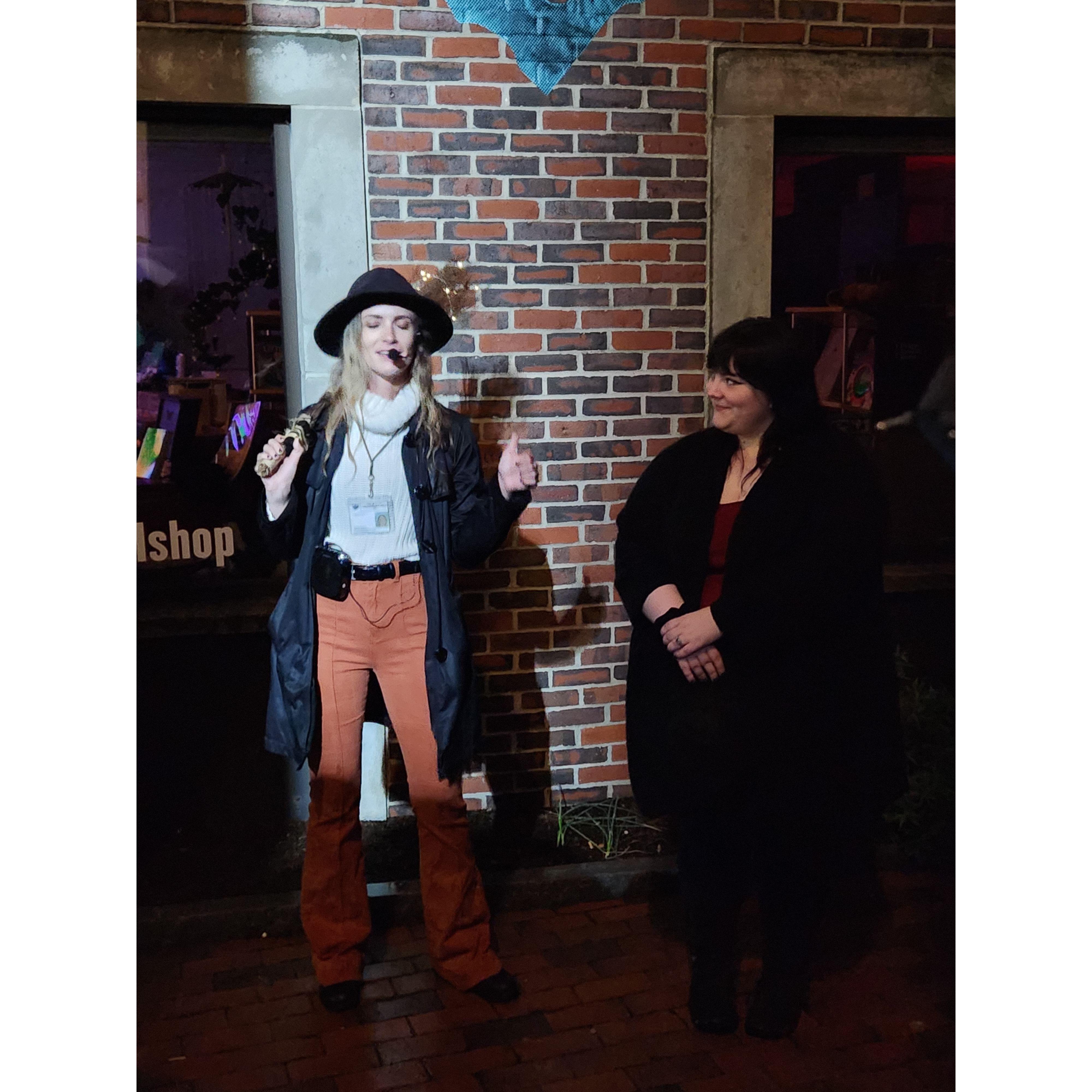 Our second Saturday tour, at night.  Our awesome guide pulled Kelli up to be the "witch" for a mock trial, after finding out about the proposal!  Although I did catch our guide blinking, my bad!