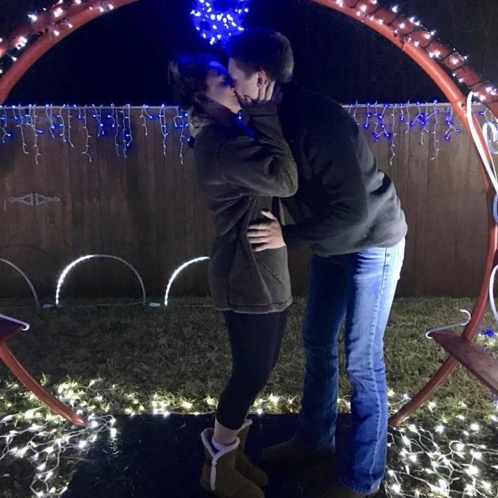 Our first Christmas, a kiss underneath the mistletoe toe<3