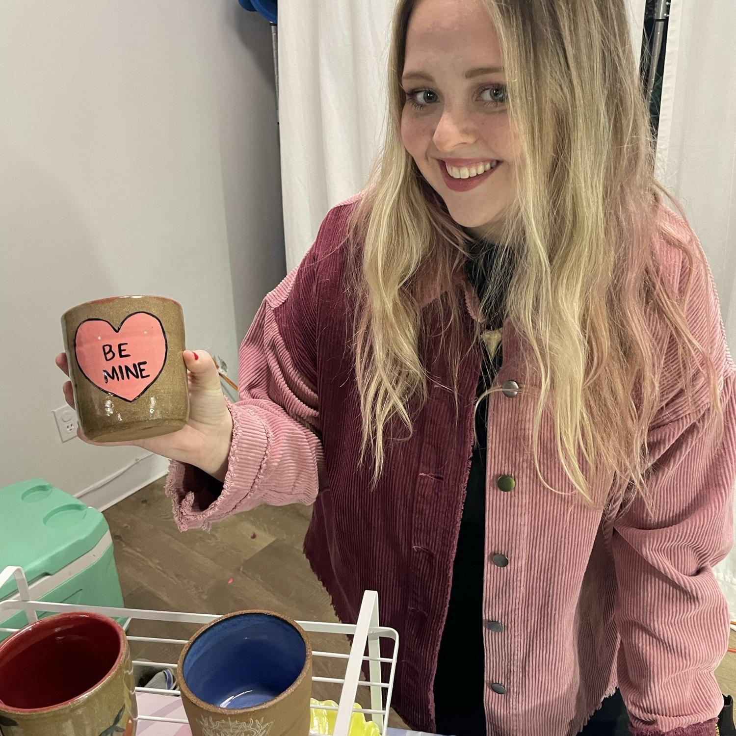 Alison selling pottery