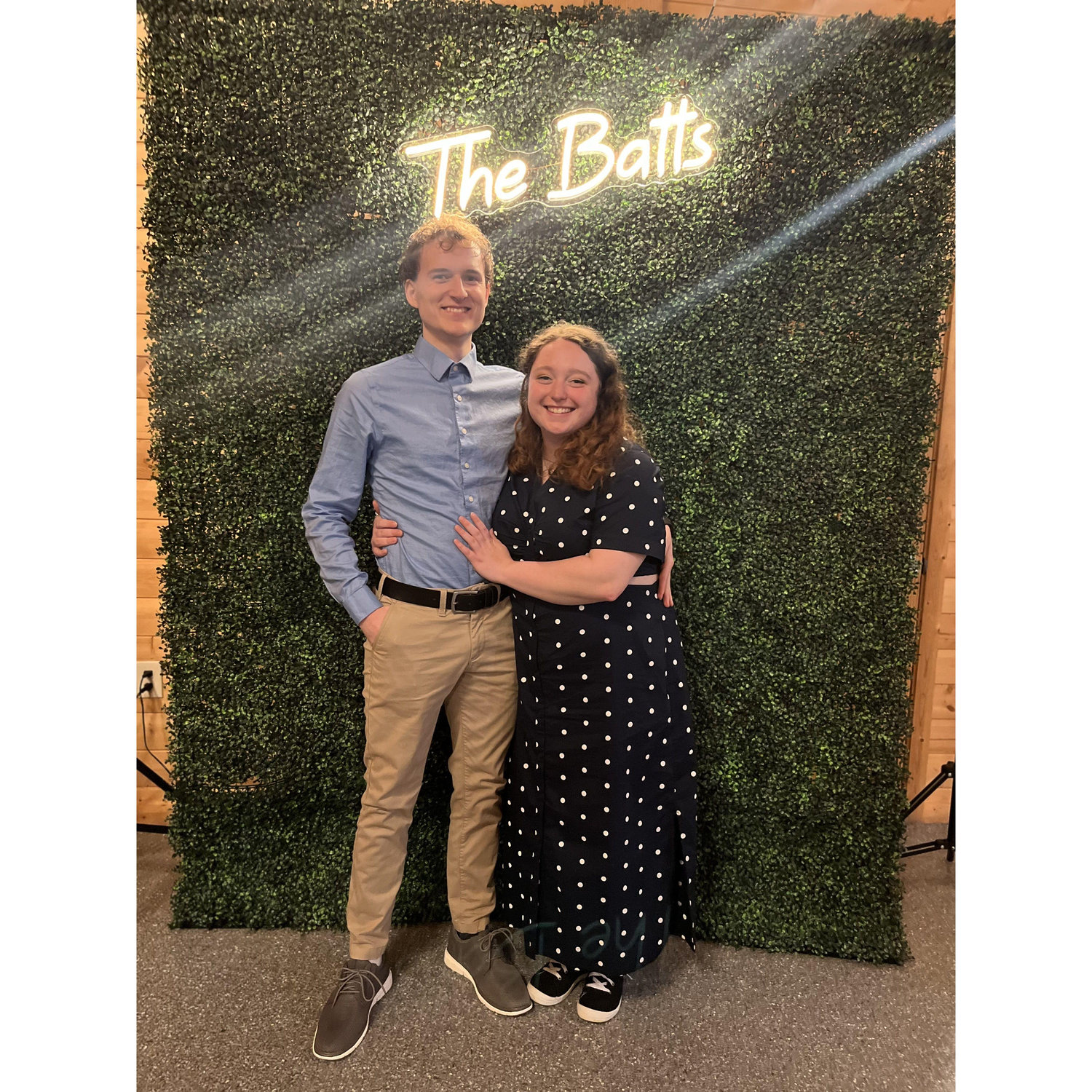 The first wedding we attended together, with some foreshadowing on the neon sign :)