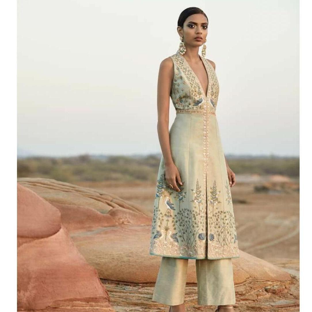 This embroidered jacket set is a sleek and modern take on Indian elegance.