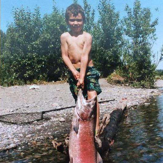 Nick with a fish as big as him! This picture is so Alaskan!