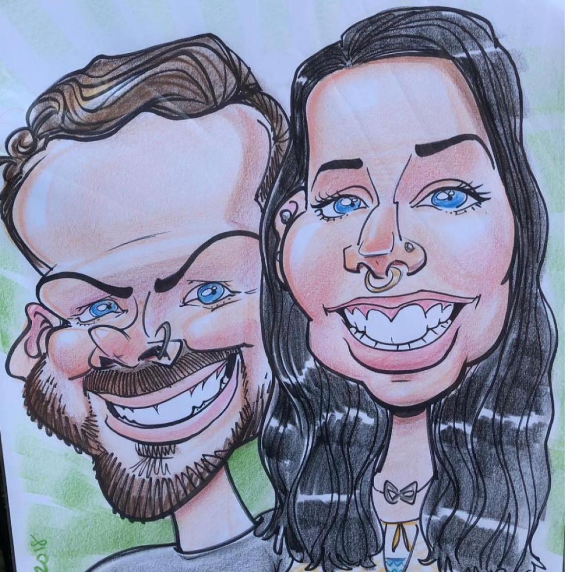 One of our favorite things to do is go to the Canfield Fair. We always get a character drawing done each year.