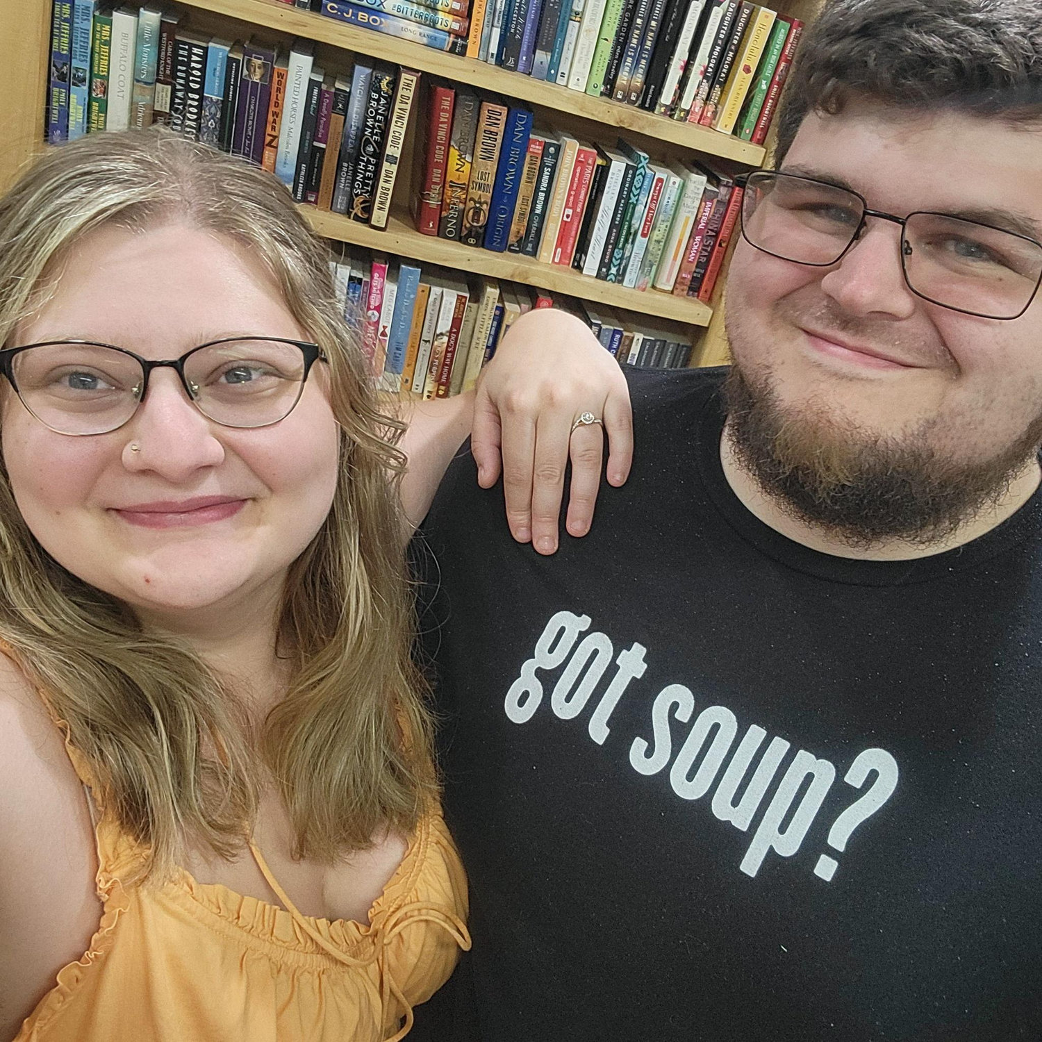 We got engaged at our favorite local bookstore!