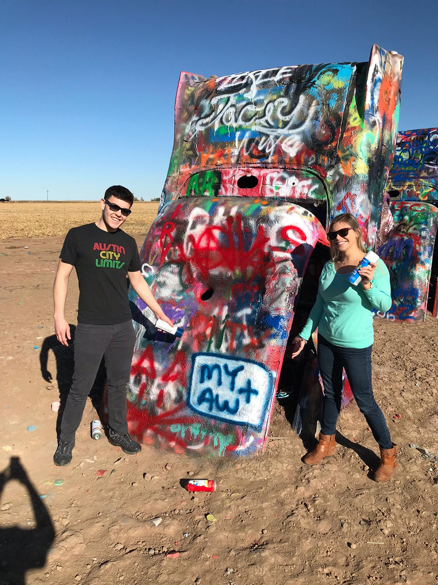 Leaving our mark at Cadillac Ranch in Amarillo, TX