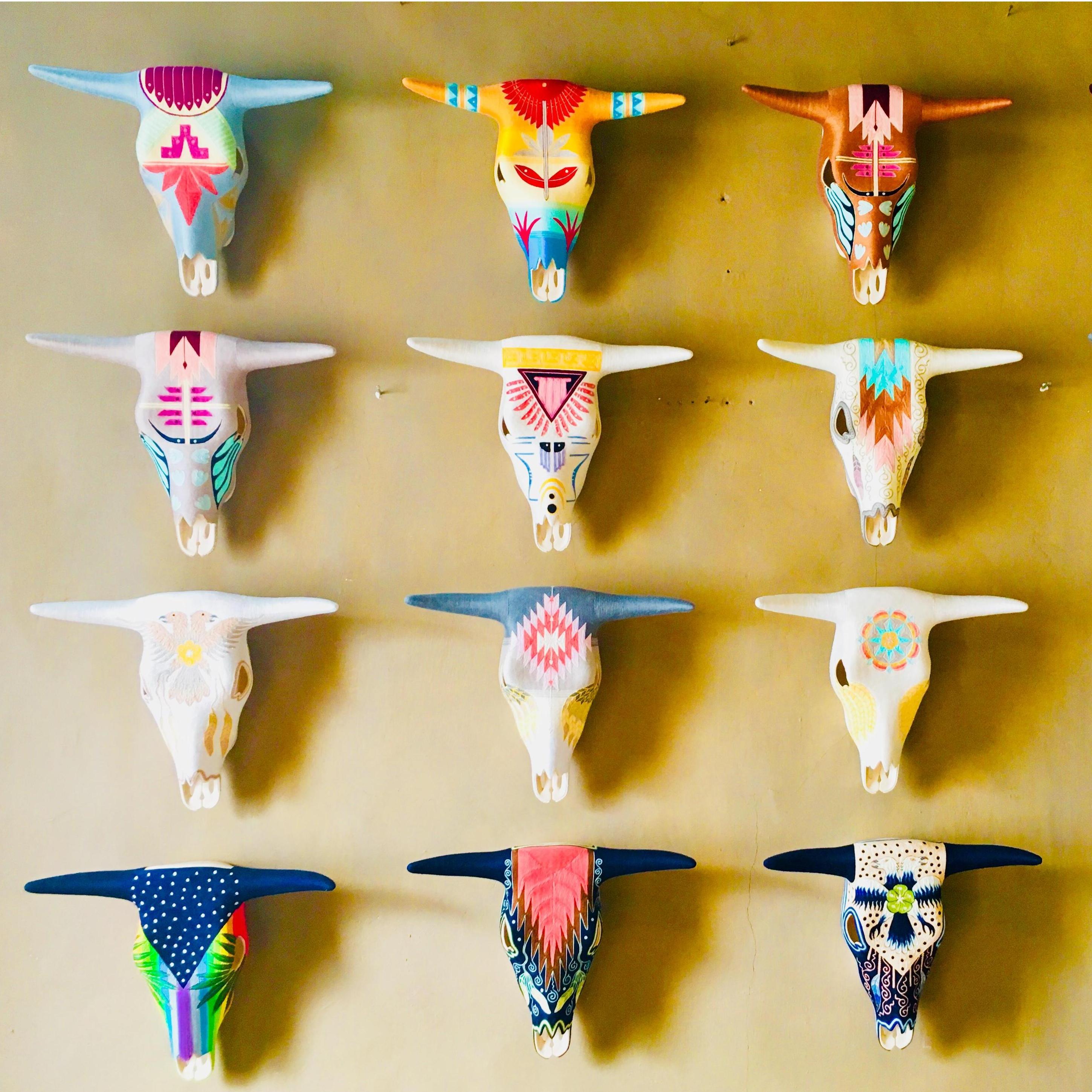 The art gallery downstairs in the first Airbnb we stayed at in SMA.  It takes the artist 3-4 weeks to hand stitch the patterns on each of these skulls.