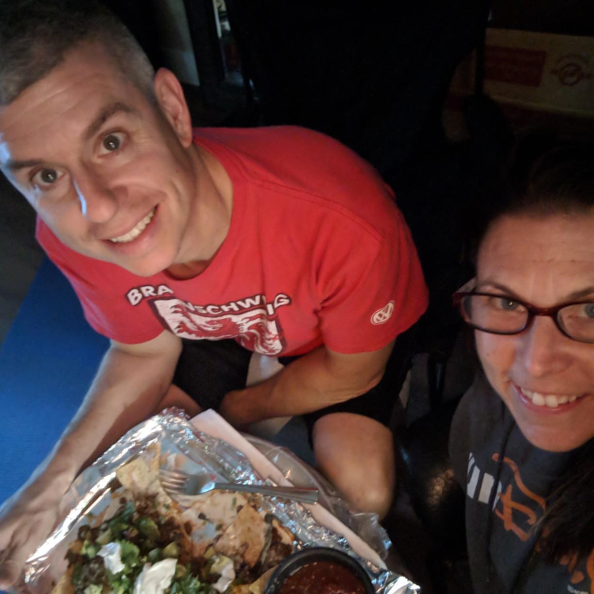 Christopher loves Kimberly's cooking! Nachos on a Friday night!