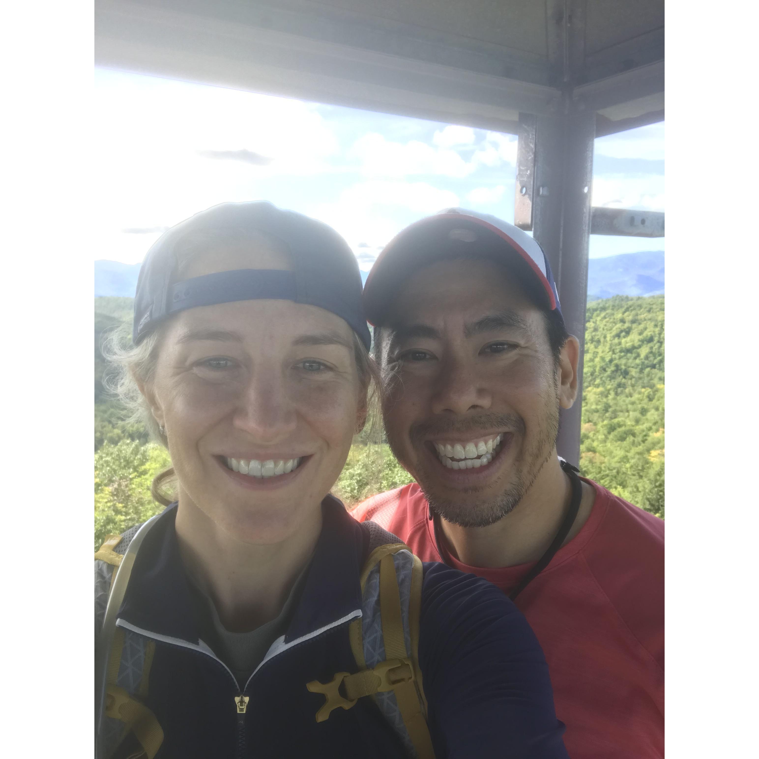 At the top of a firetower on Poke-O-Moonshine Mountain.