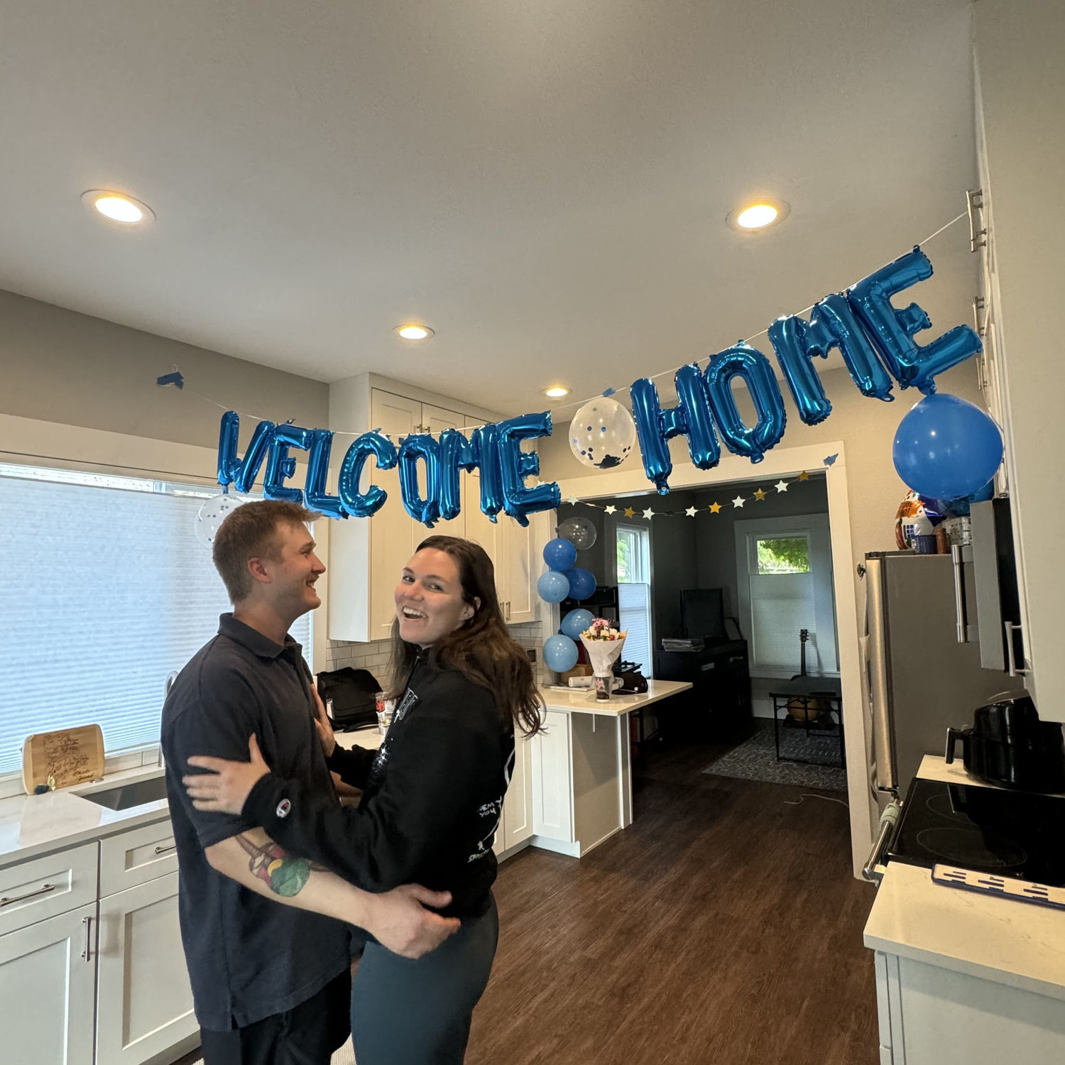 when Brittney moved up to Washington to live with Travis, he decorated the yard and house with balloons and flowers!