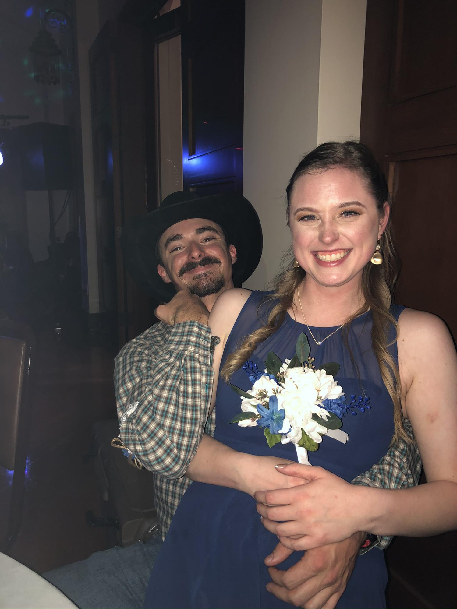 Caught the bouquet toss AND the garter toss. We knew it was meant to be!