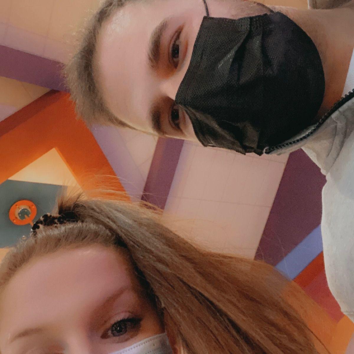 This is the first photo we have together. It was taken on our third date to see Spiderman: No Way Home. We went to Chili's after!