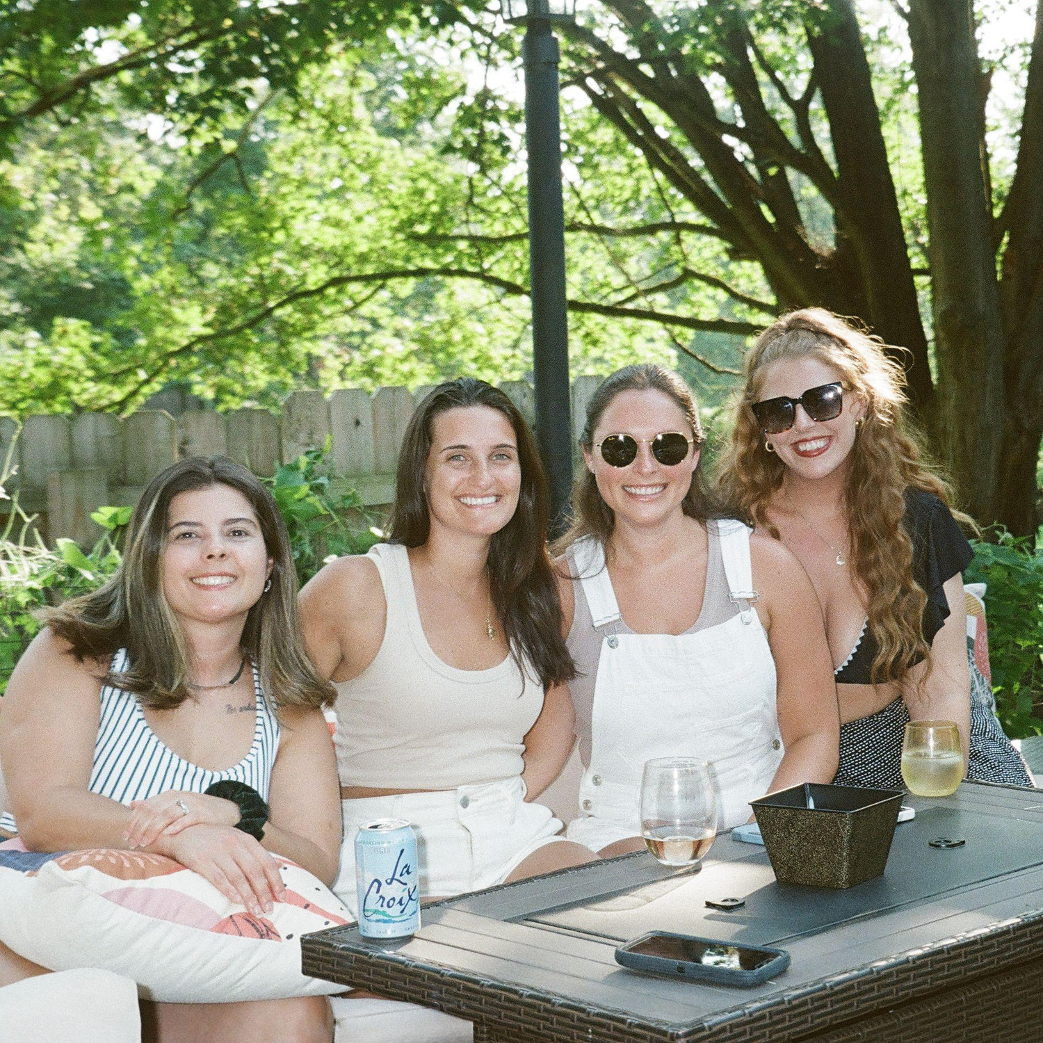 Ary, Caroline, Margret, and Leah at the pool, with no RC boats. August 2025