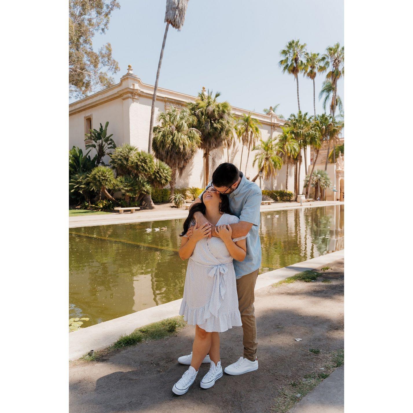 Evan whispering hilariously sweet nothings in Nicole's ear