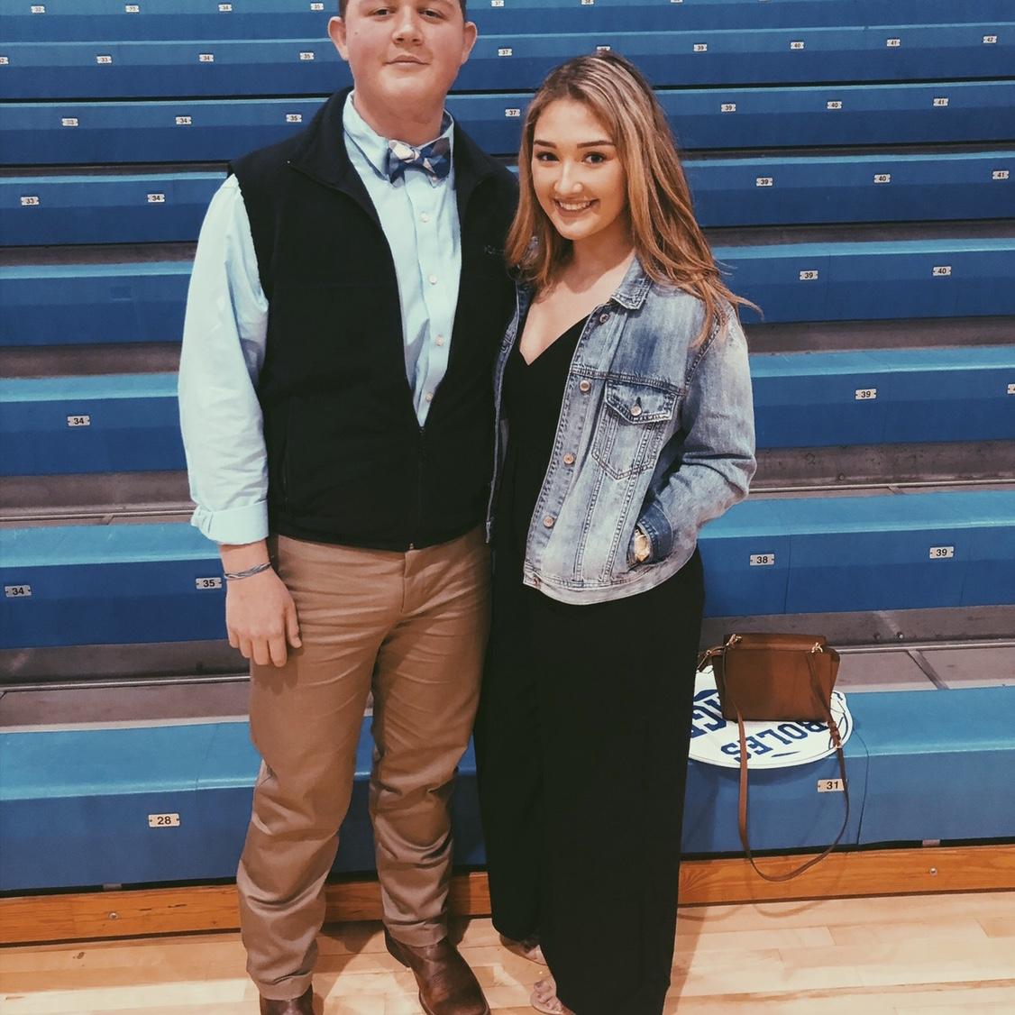 One of our first pictures together. Laurens senior football banquet