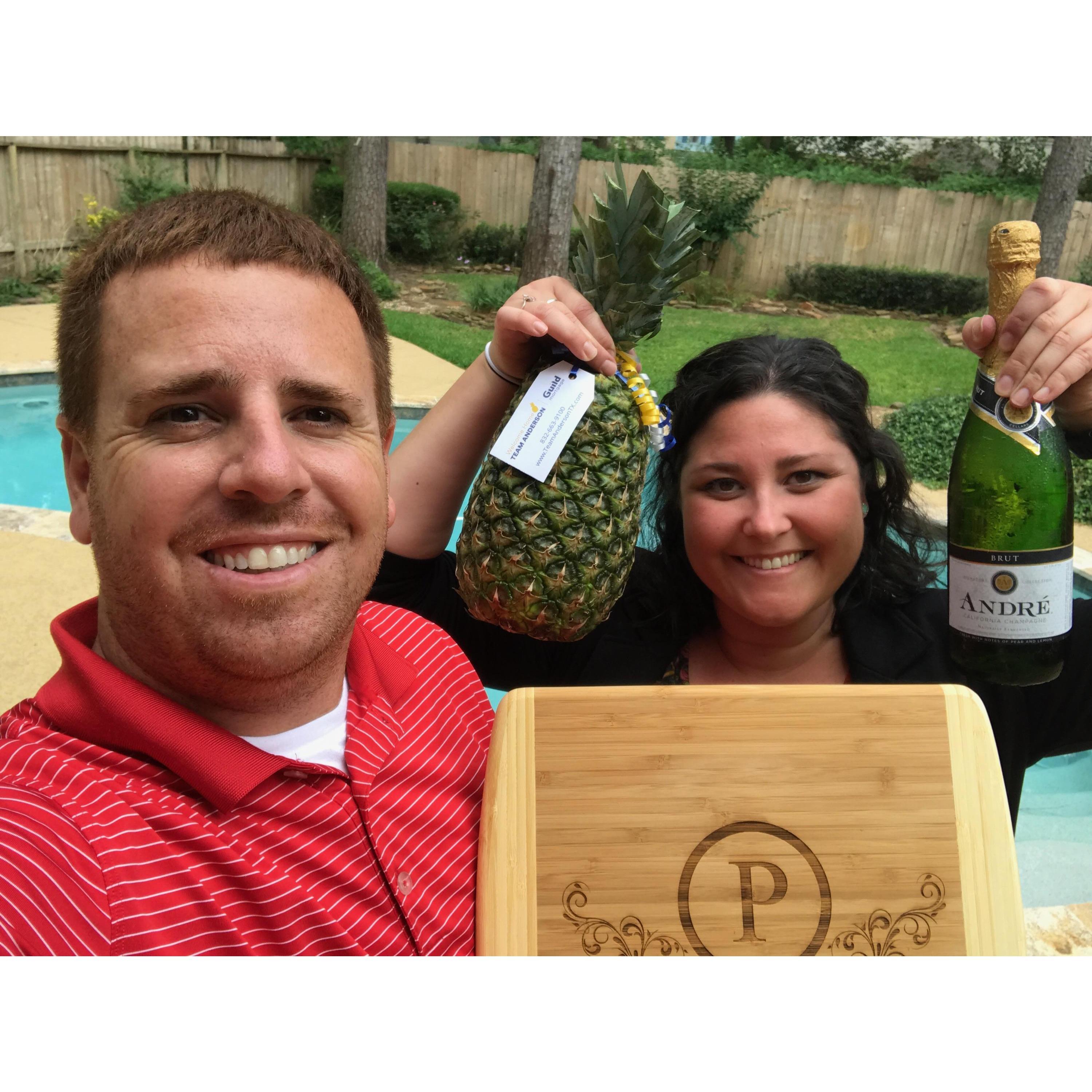 Celebrating the new house with gas station champagne and a pineapple!