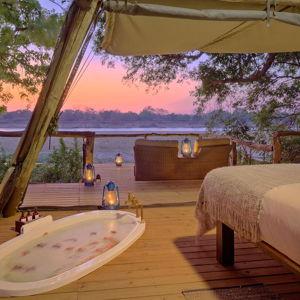 Stay at a green safari camp in Zambia's South Luangwa National Park