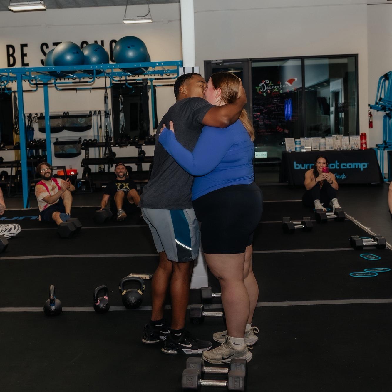 Public proposal in front of friends at burn boot camp